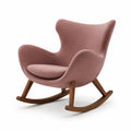 Mecedora de terciopelo rosa con estructura de madera